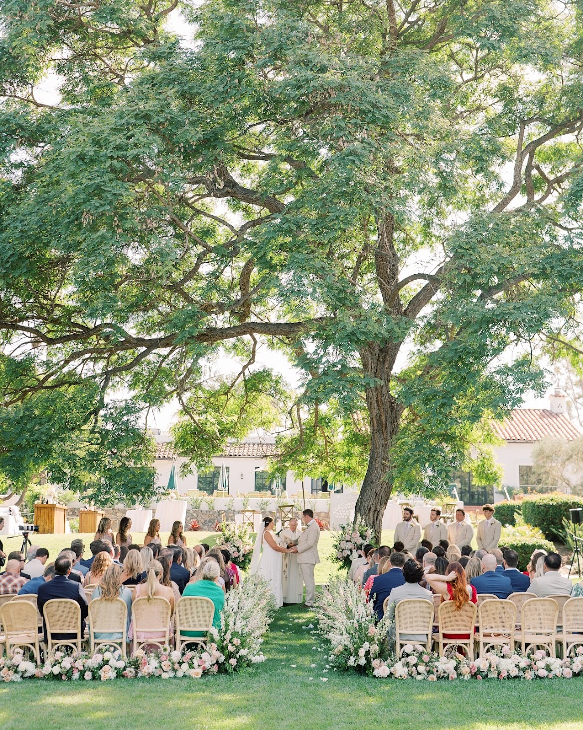 Guests enjoy the destination wedding at the Inn at Rancho Santa Fe in San Diego, California
